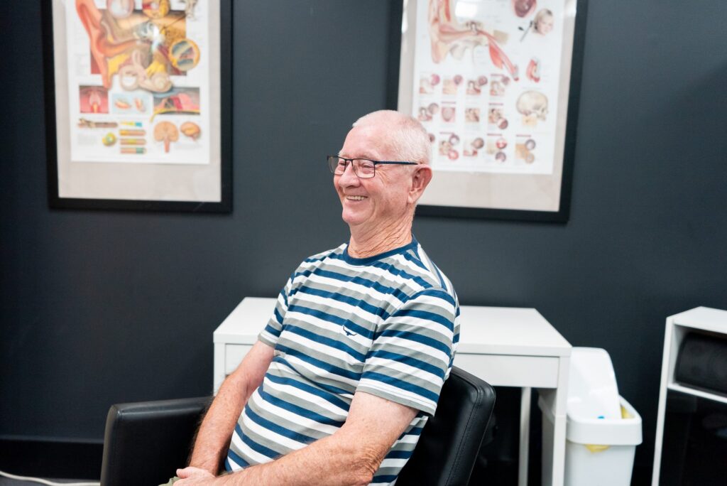 Happy patient during a hearing assessment